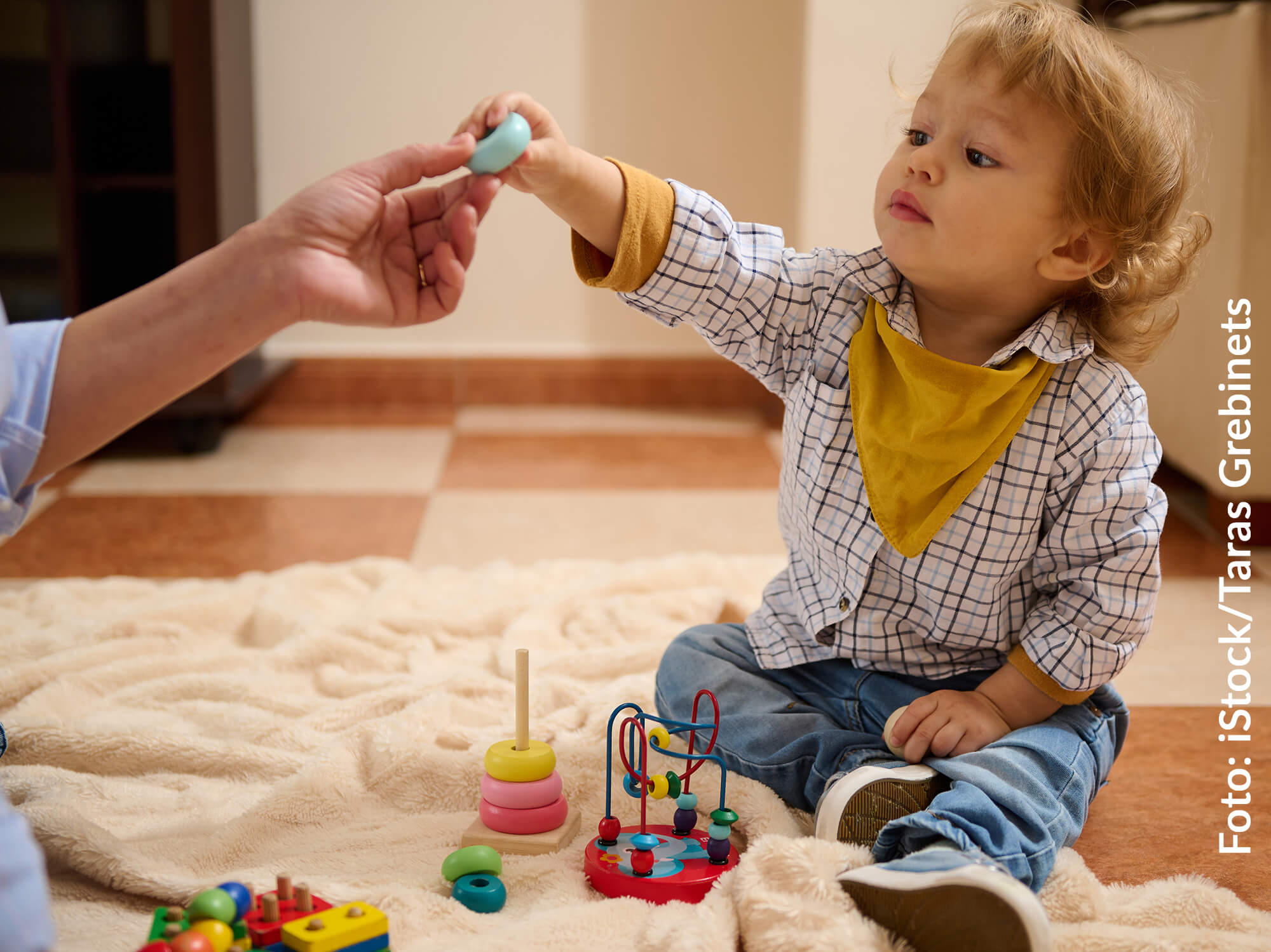 Die Kindertagespflege bietet eine gleichwertige Alternative zur Kindertageseinrichtung. Foto: iStock/Taras Grebinets